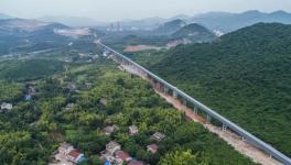 水泥熟料天上走!最長耐高溫“空中走廊”試運(yùn)行 　　