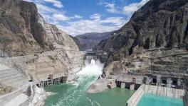 世界首座300米級(jí)低熱水泥混凝土特高拱壩全線貫通！