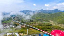 總長13.5公里！空中水泥熟料運(yùn)輸長廊試運(yùn)行！